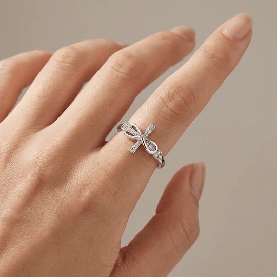 TIE & CROSS SILVER RING WITH ZIRCONS - (ADJUSTABLE)